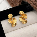 Susan | Stylish Flowy Gold and Silver Earrings